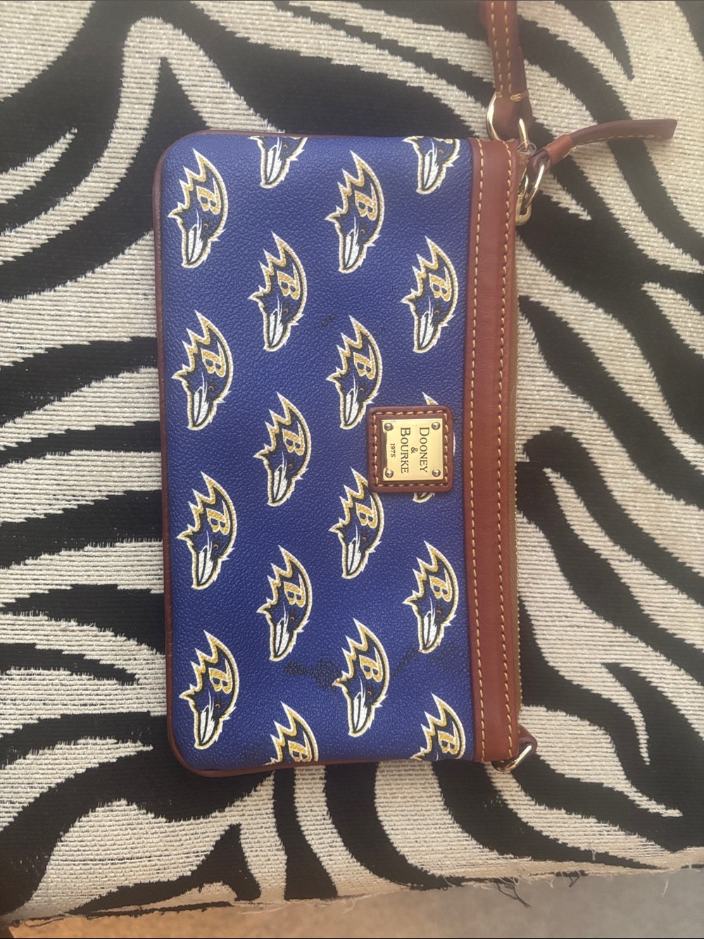 Dooney & Bourke Purple and Brown Baltimore Ravens Logo Wristlet